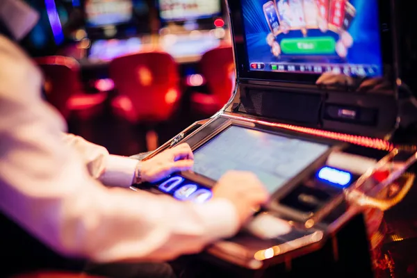 A young woman relaxing with her phone while dynamic casino elements float around her, illustrating the smooth mobile experience offered by the CHAMBAWINPH app.