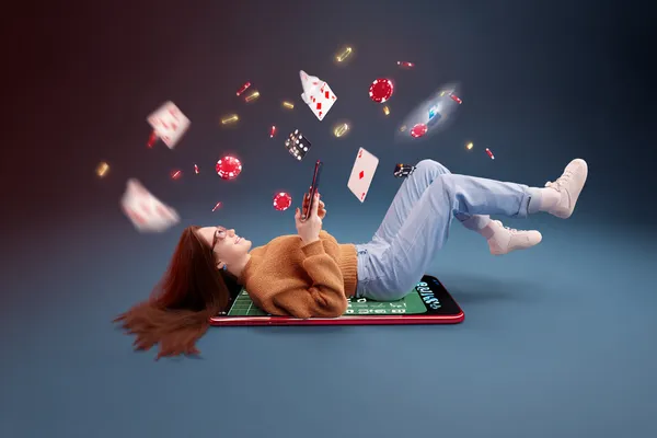 A glamorous woman holding casino chips in a neon-lit environment, representing the premium online casino atmosphere of CHAMBAWINPH.